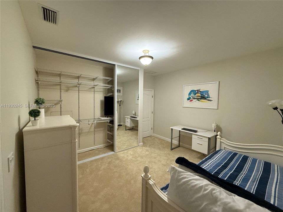 BEDROOM #4 (clothes closet doors open)