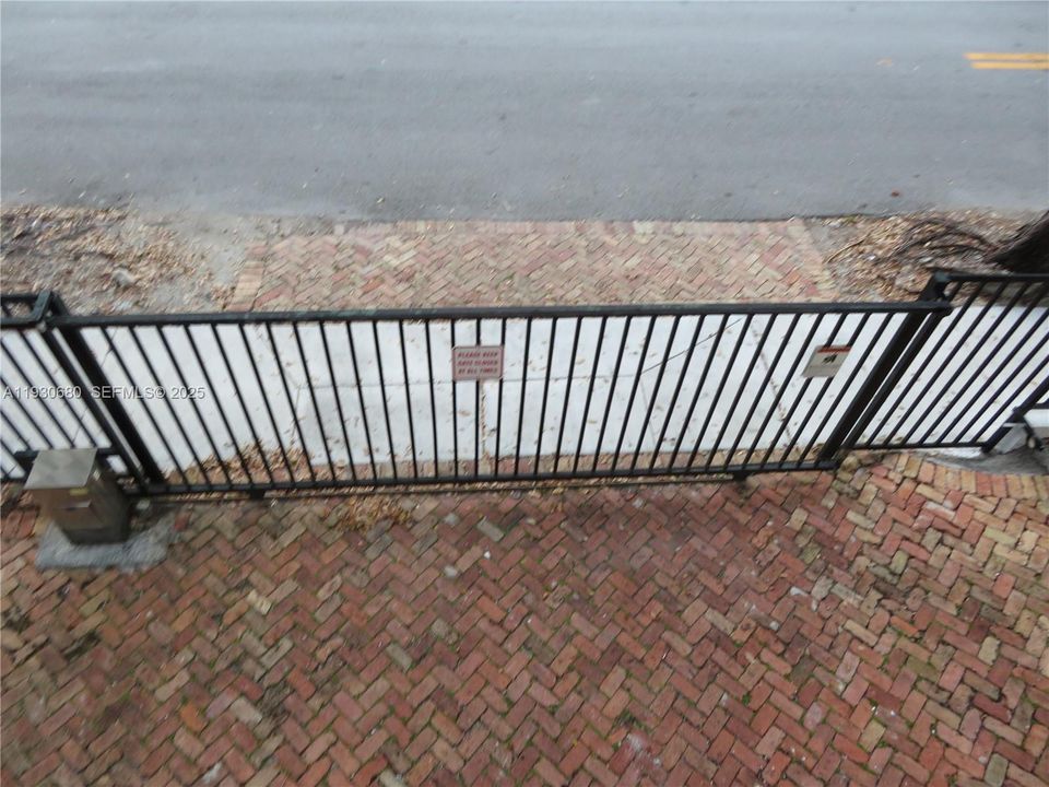 FRONT GATE WITH REMOTE CONTROL TO ENTER AND PARK