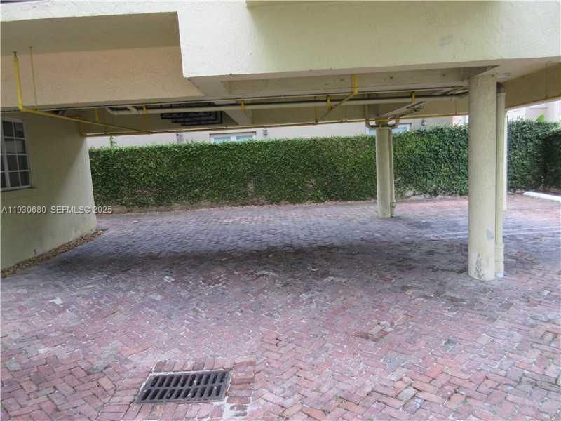 PARKING UNDER BKDG WITH ELECT GATE TO ENTER