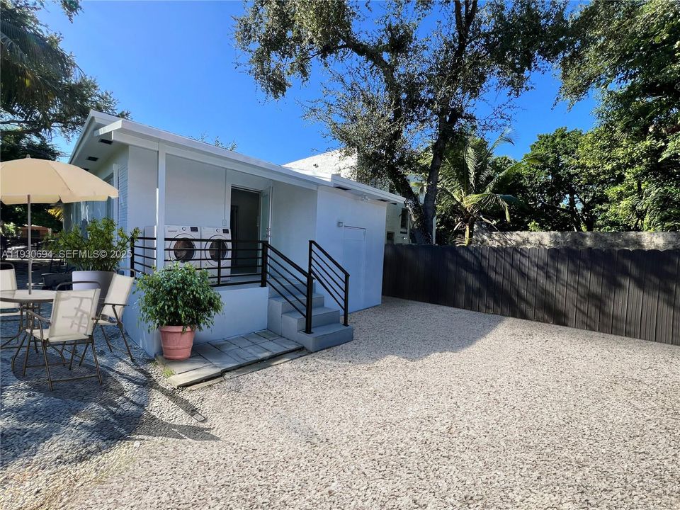 Patio furniture and exterior washer and dryer not included.