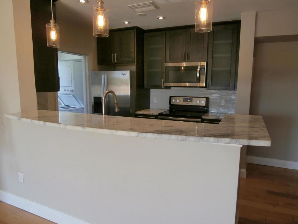 KITCHEN TO LIVING ROOM