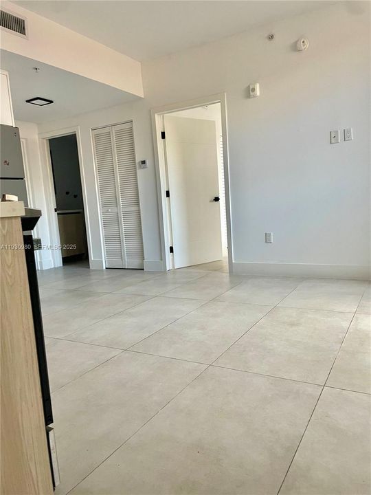 west bedroom entry door next to the bathroom