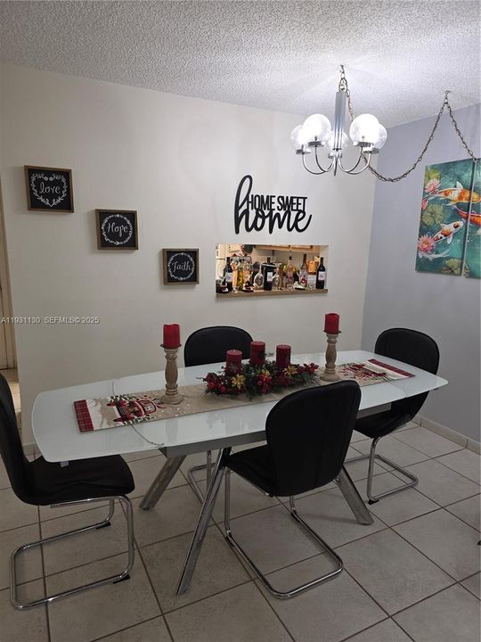 DINING AREA WITH PASS THRU WINDOW TO KITCHEN