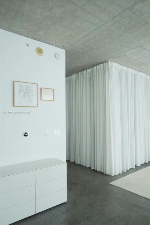 Living room viewing entrance. Smart thermostat.