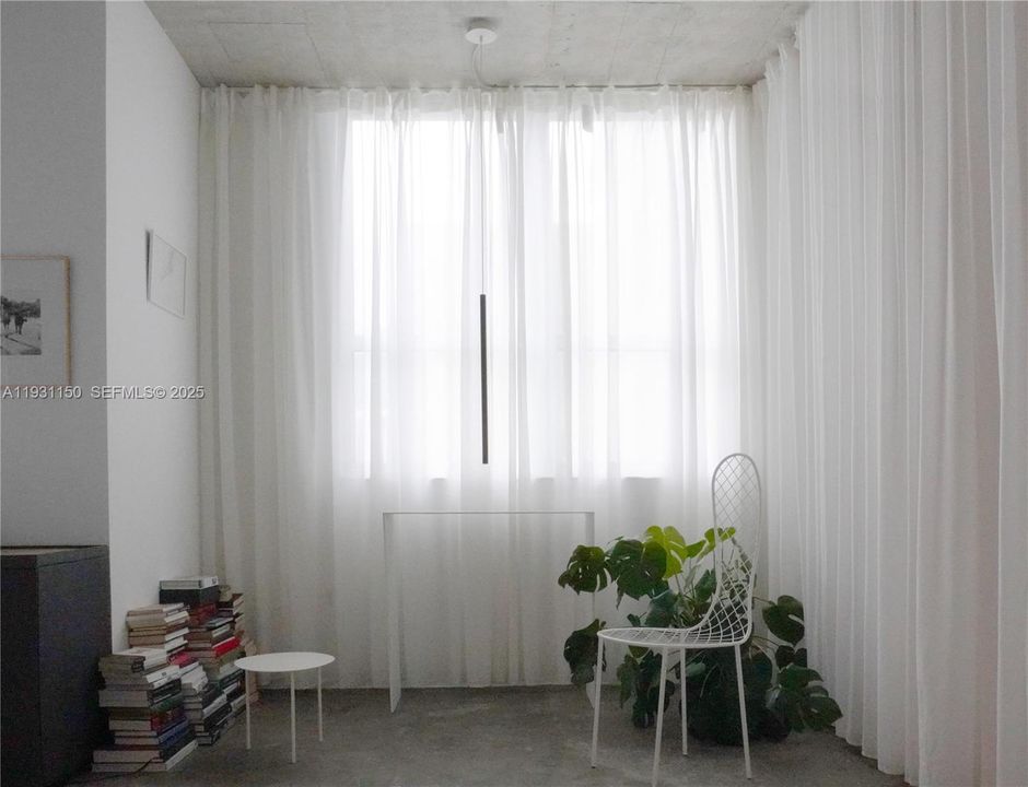 Reading area with pendant lighting.