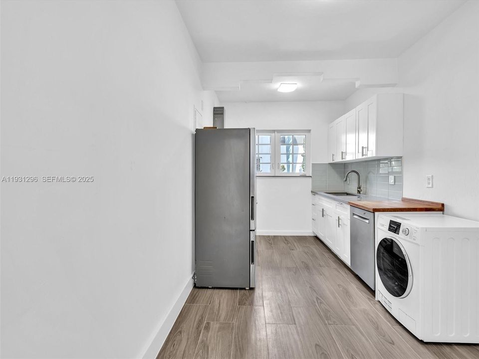 Washer/Dryer Combo 2 in 1 - Large Kithcen with space for table and cabinets.