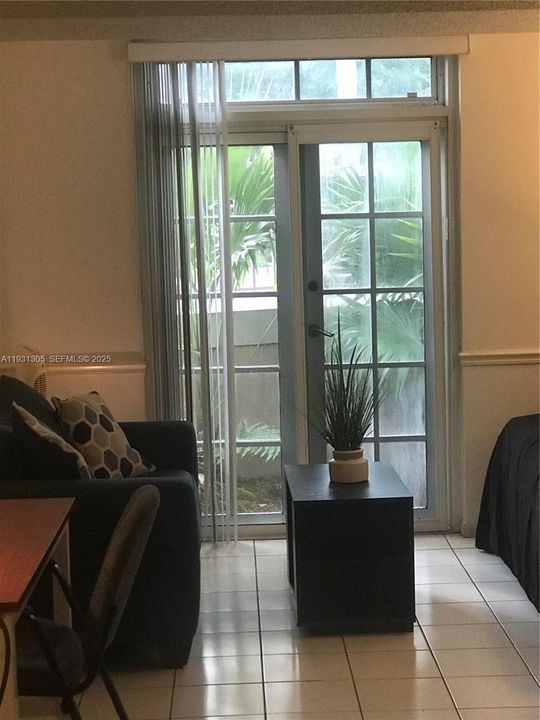 French doors leading to walled garden