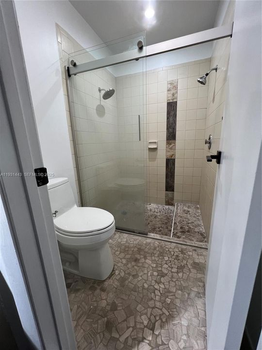 Pretty primary bath with updated shower