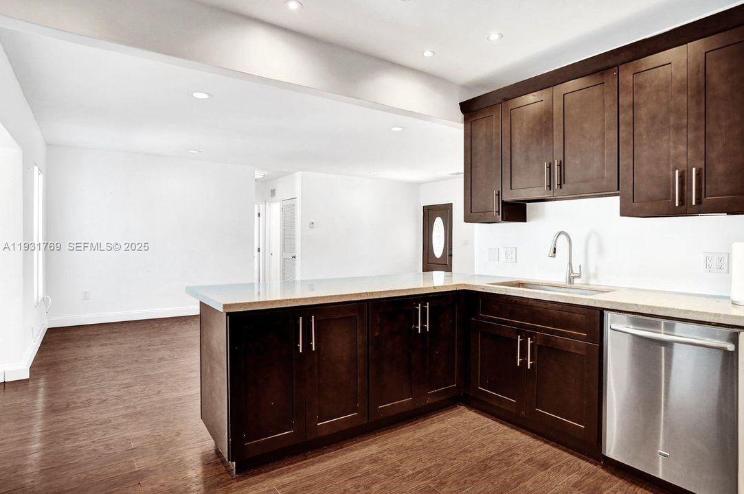 Ktchn flows into dining/living areas.