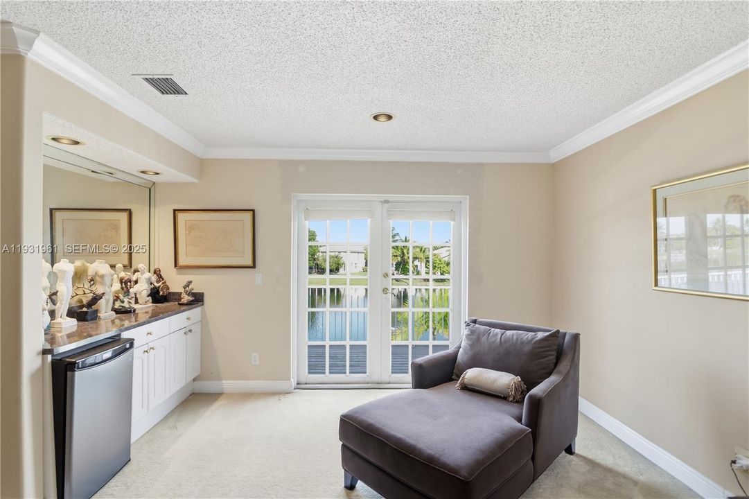 Relaxing Sitting Area overlooking balcony & lake