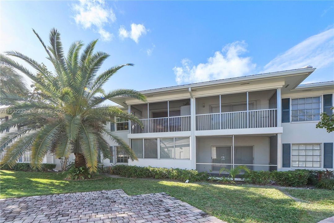 2nd floor unit with palm tree