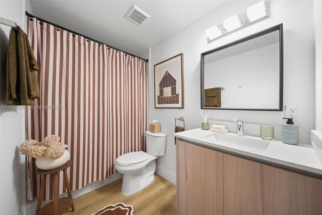 En-suite bathroom connected to the primary bedroom.