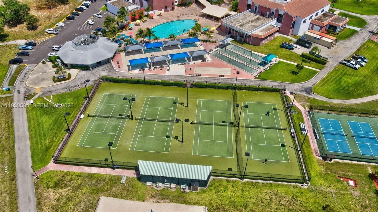 POOL AREA, CLUB HOUSE, TENNIS AND PICKLE BALL AREA