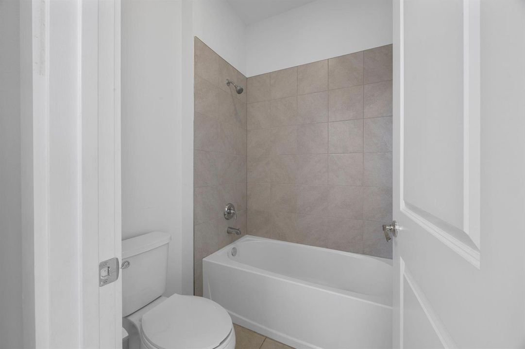 Toilet and shower tub