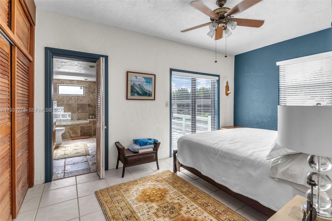 Sliders Lead to Back Patio Overlooking the Grove. Natural Light. With In-Suite Bathroom