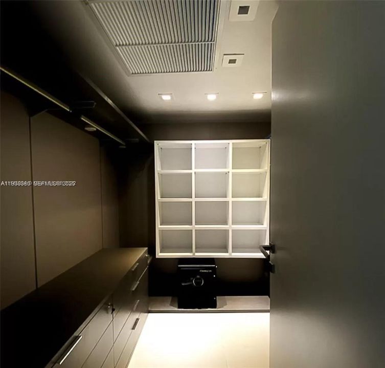 Huge walk in closet in master bedroom