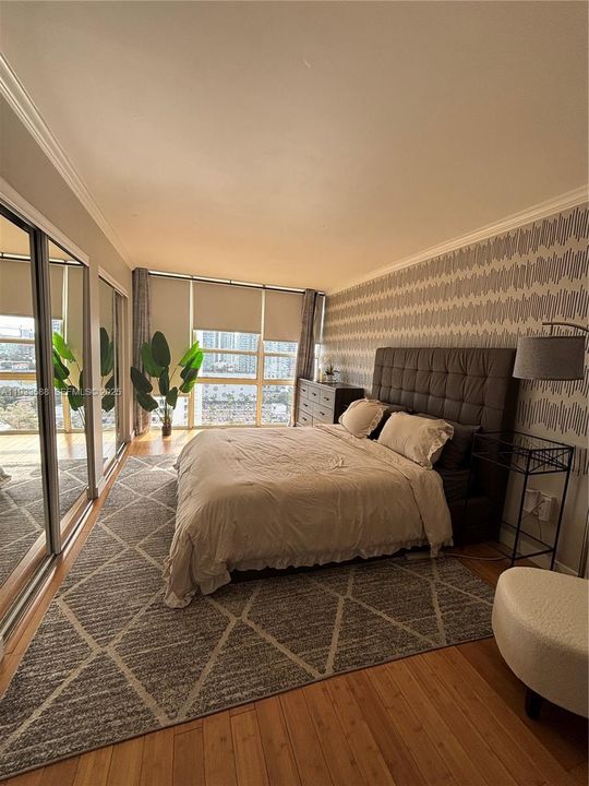 Huge Master Bath with floor to ceiling windows, mirrored closet and walk-in closet