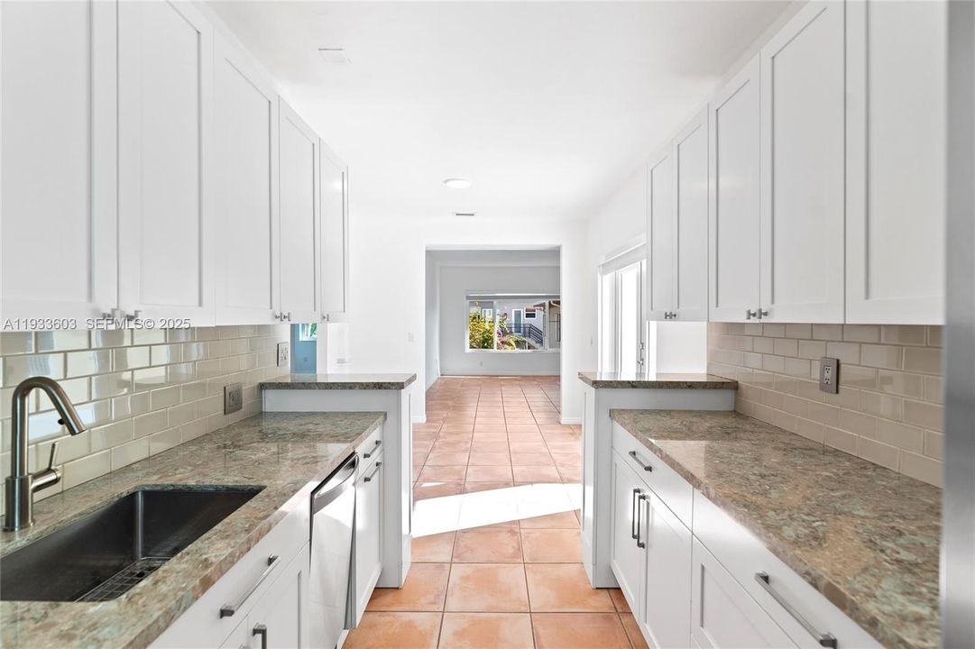 Updated Kitchen with Stainless Steel Appliances and Gas Stove and New Cabinets