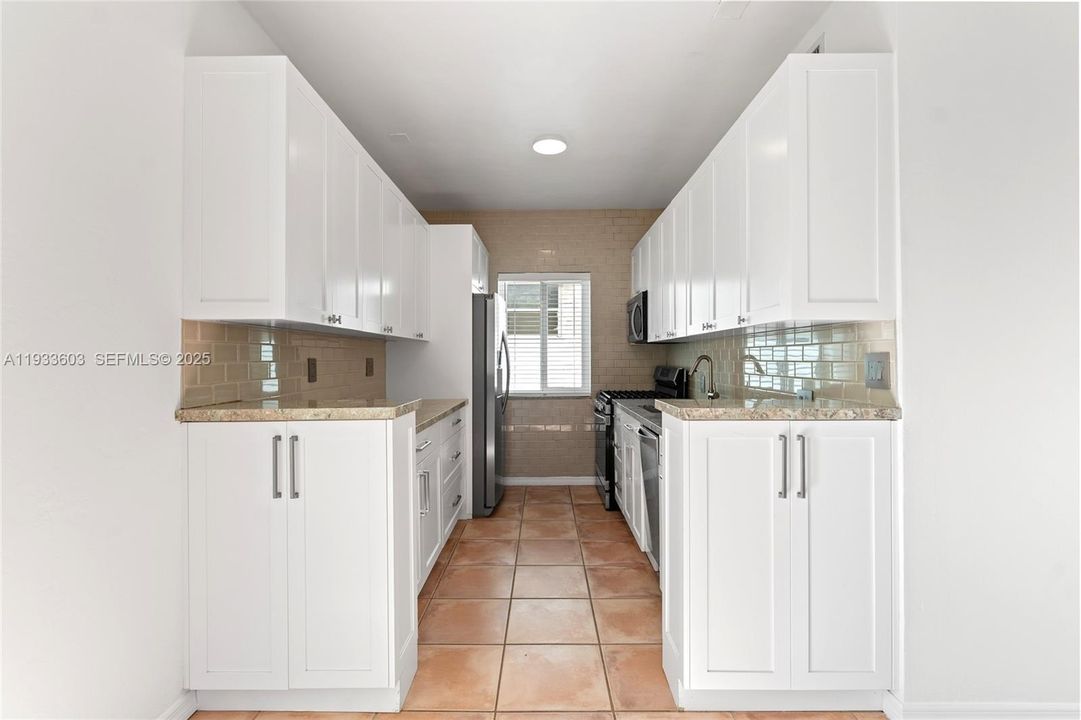 Updated Kitchen with Stainless Steel Appliances and Gas Stove and New Cabinets