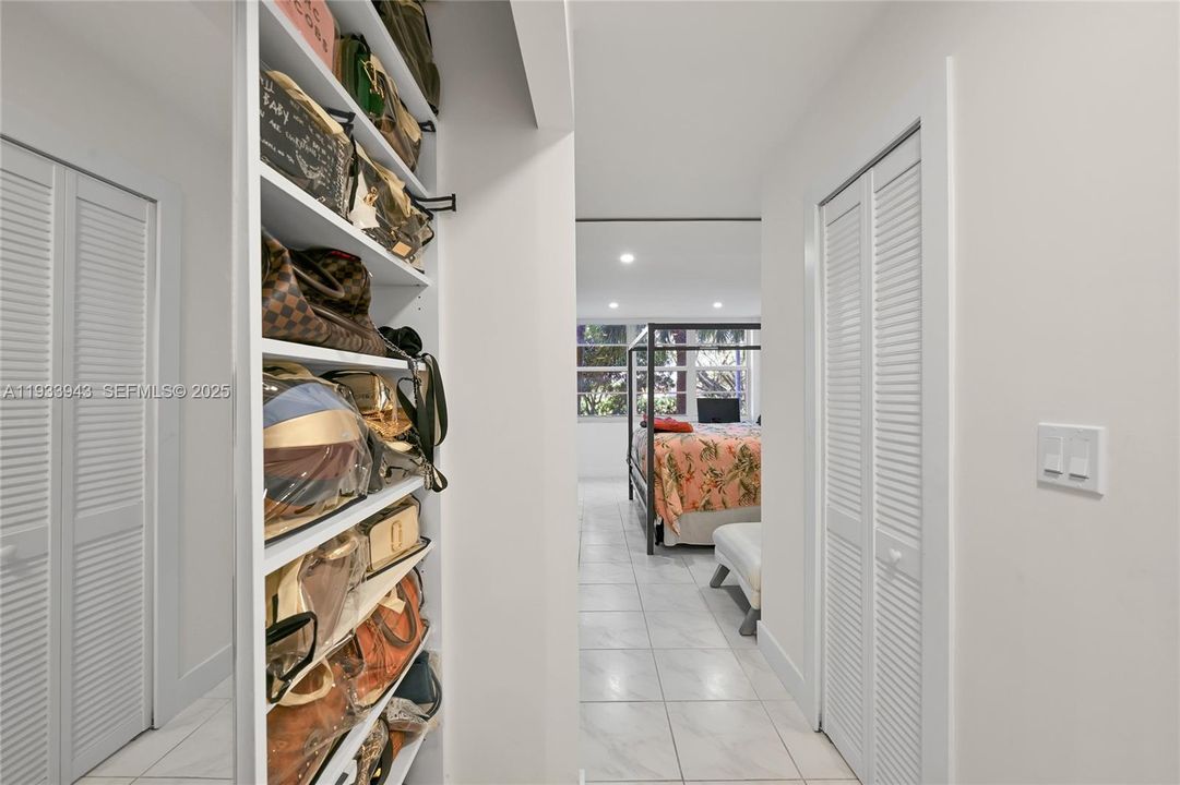 Primary Bedroom with Walk-In Closet and Built-In Storage