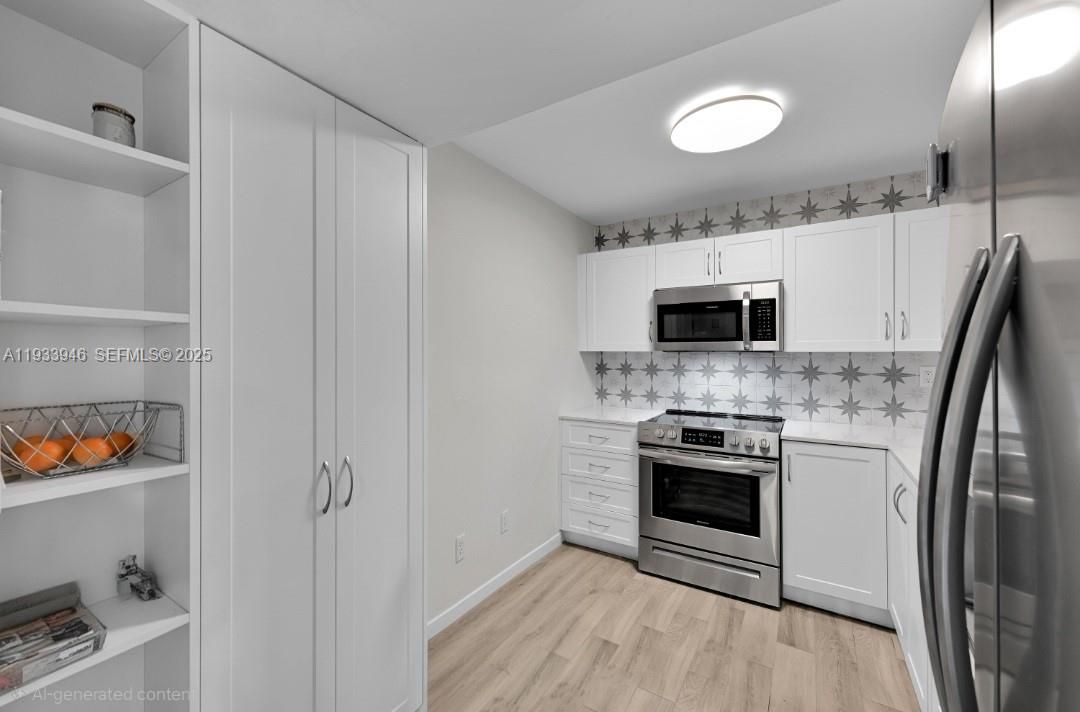 Fully renovated kitchen with modern cabinetry