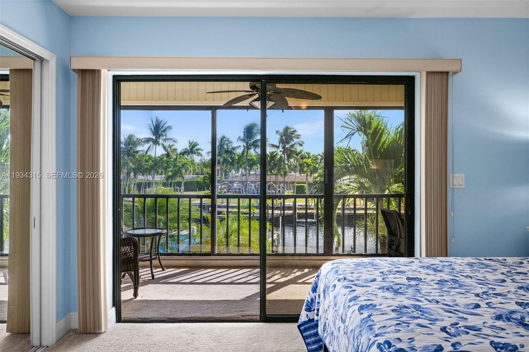 Primary bedroom has a view of the canal