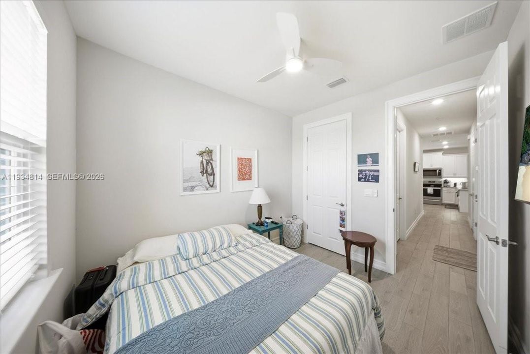 2nd bedroom with ceiling fan