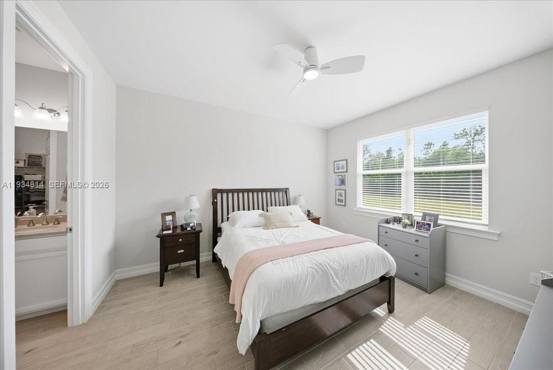 with light wood-style tile flooring