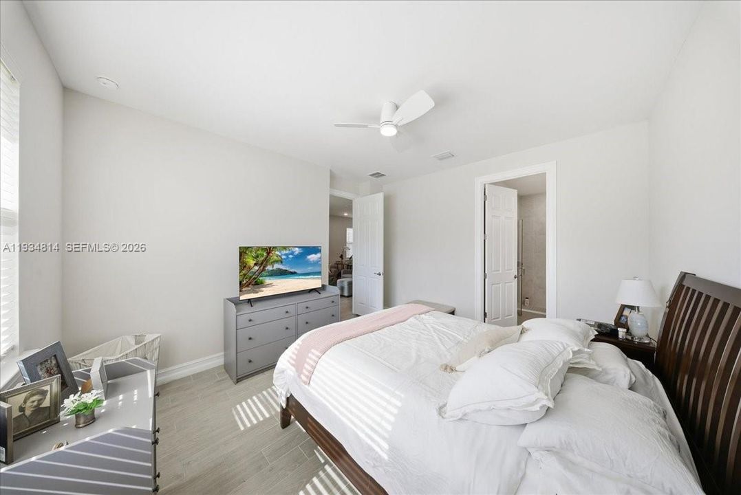 with light wood-style tile flooring