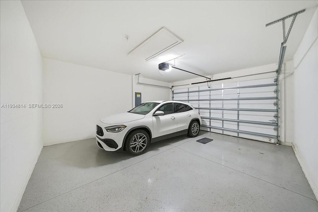 with electric panel and auto garage door opener