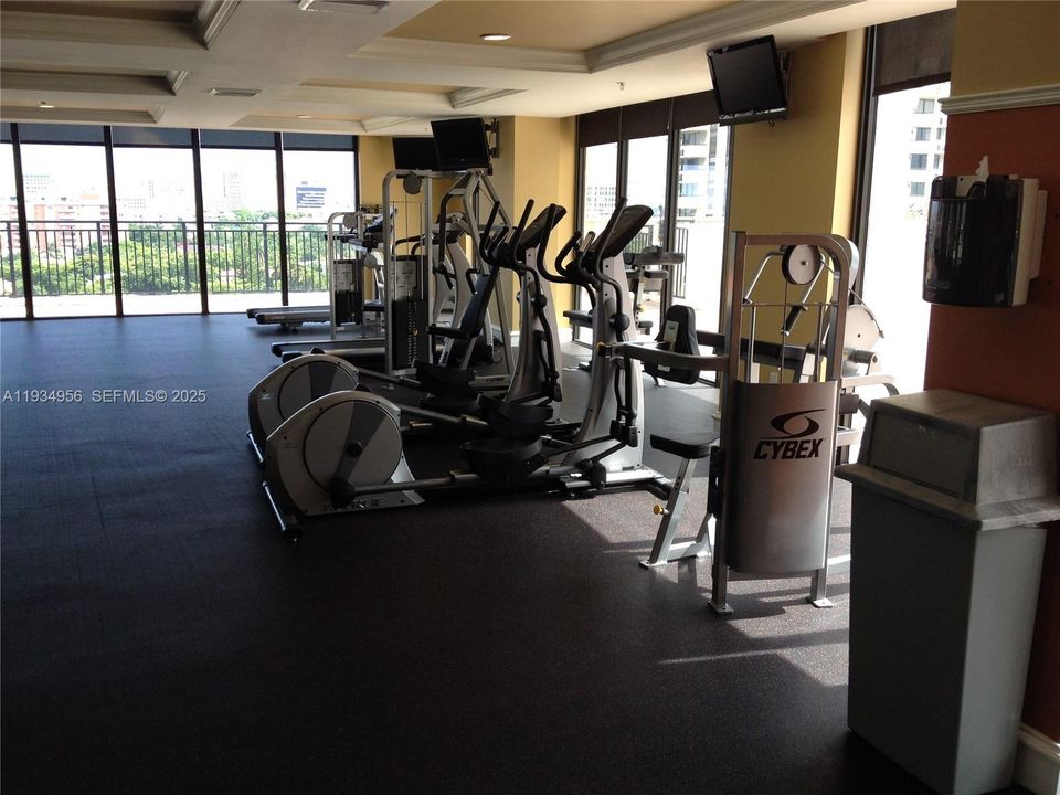 Well Equipped Gym Faces Rooftop Pool & View of Coral Gables
