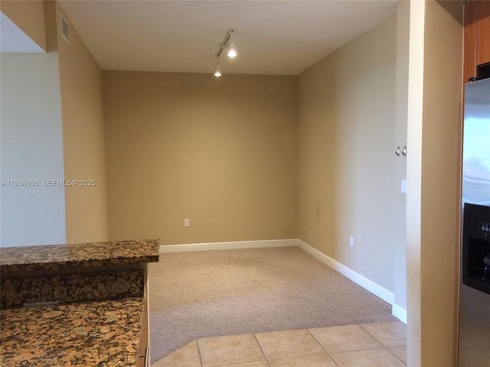 Separate Dining Room Adjacent to Kitchen
