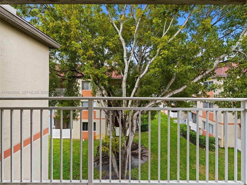 Primary bedroom garden view balcony
