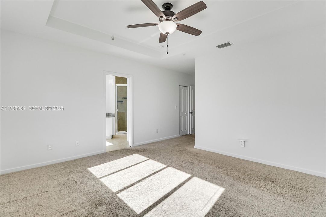 Primary Bedroom View to Bathroom & Closets