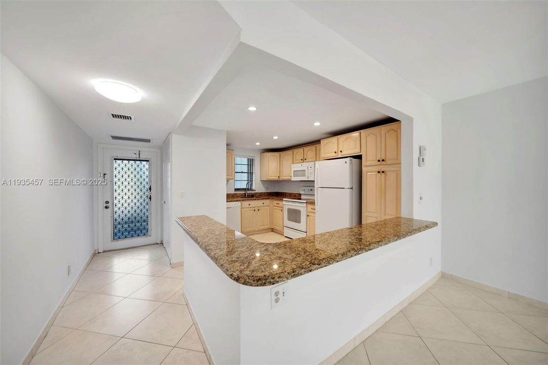 Updated kitchen with Granite countertop breakfast bar