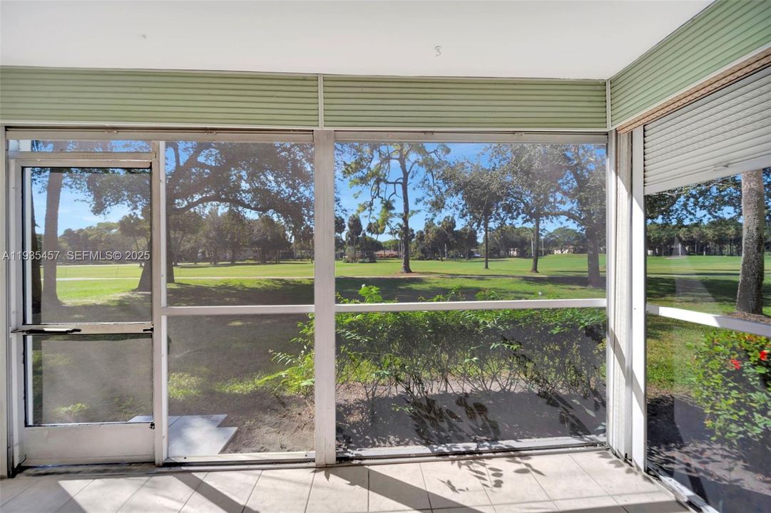 Private screened porch overlooking the golf course