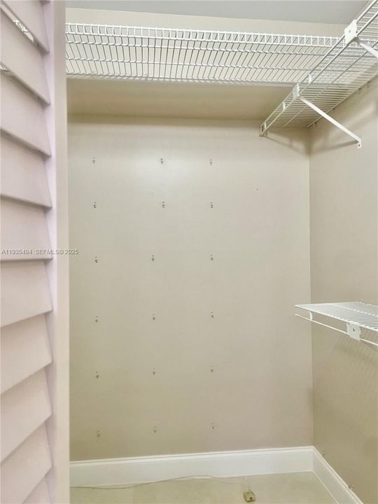 PRIMARY BEDROOM WALK IN CLOSET