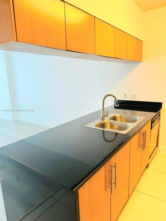 Kitchen detail featuring stainless steel appliances.