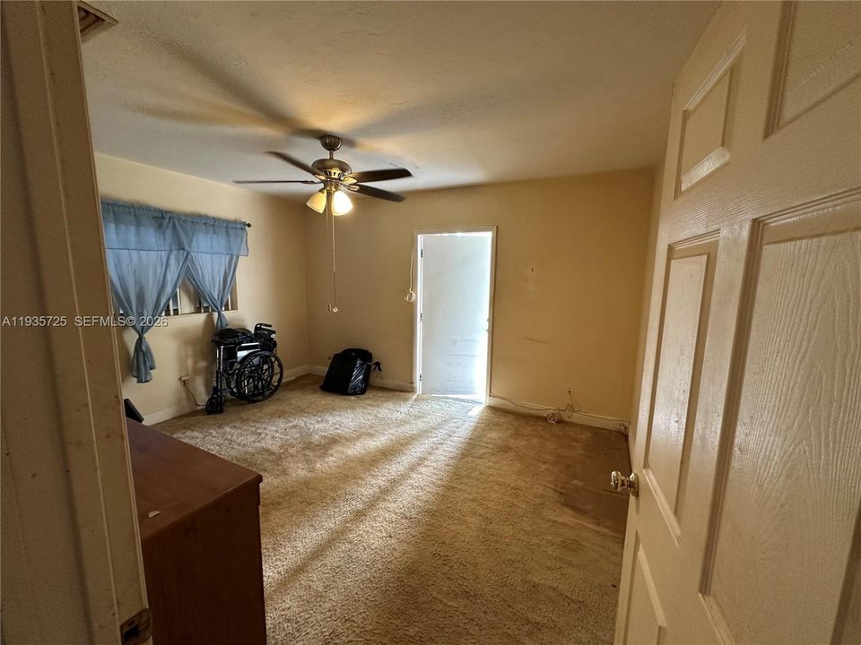 Master Bedroom with access to yard.