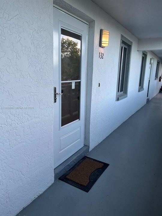 Front Entrance with new Storm door and New entry door.