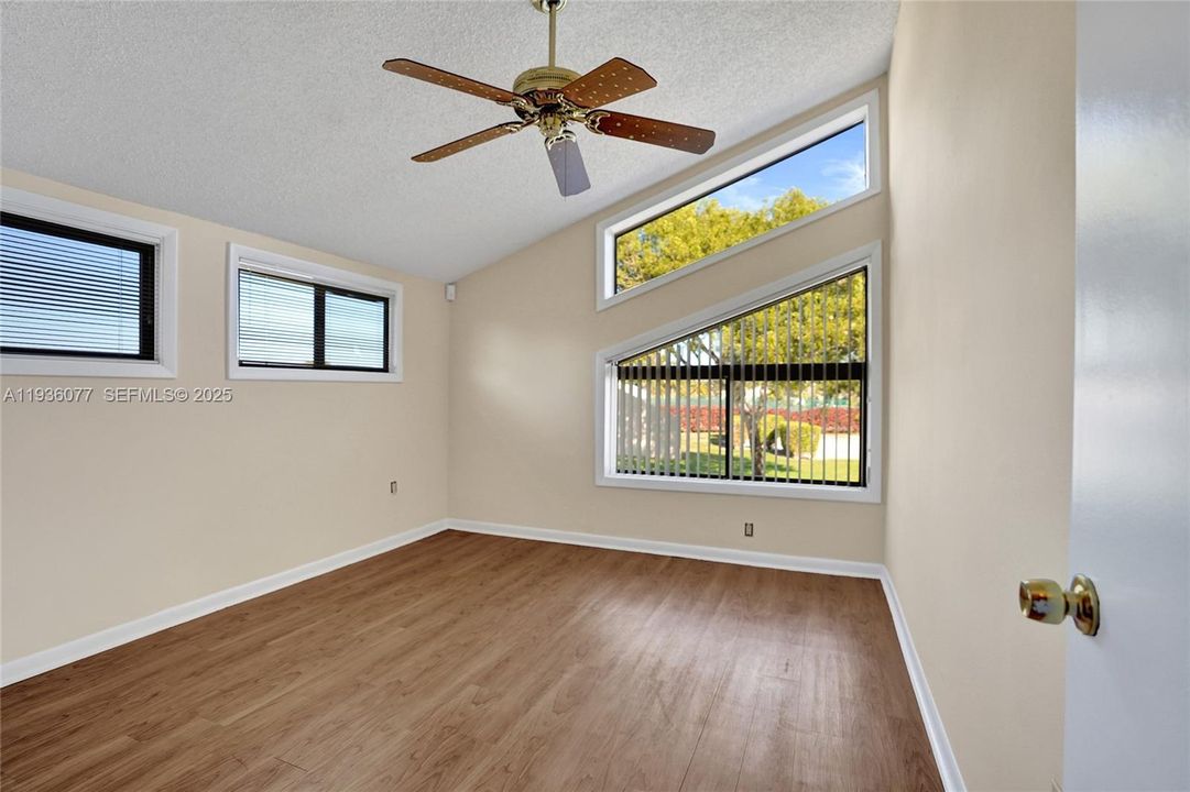 Lots of light in this upstairs bedroom!