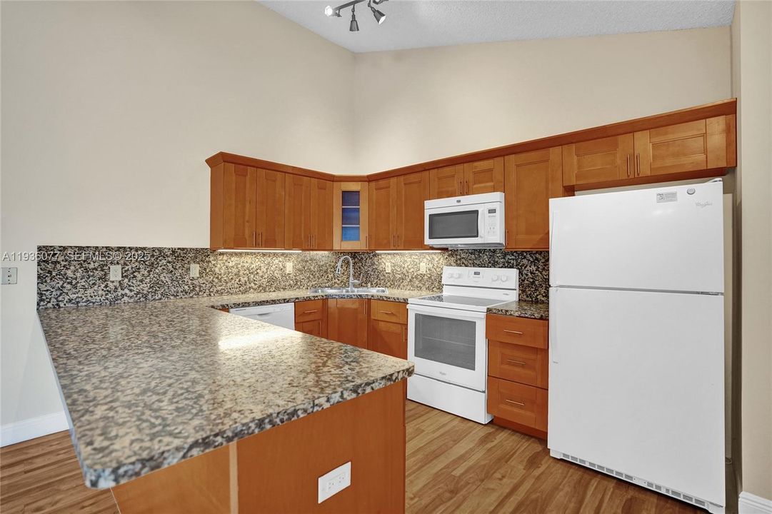 Featuring granite look counter tops!