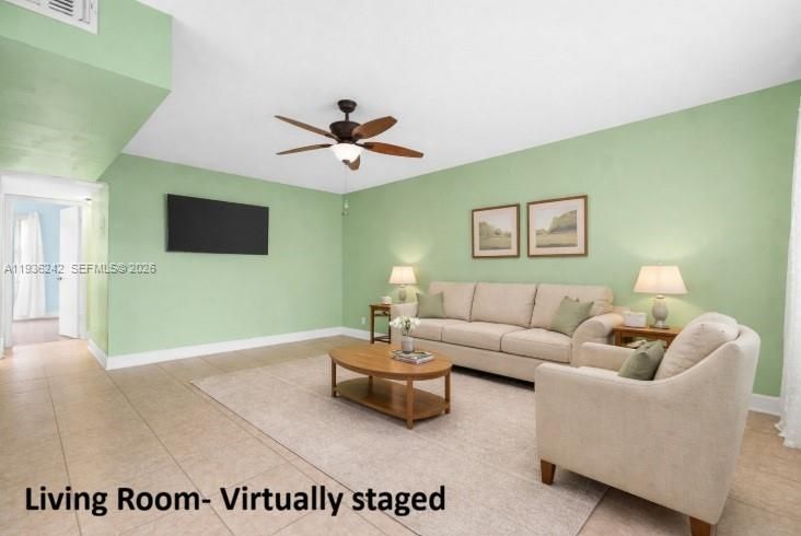Virtually staged living room (Already mounted TV included in purchase)