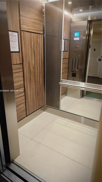 4 elevators per bldg. ,newer and nice