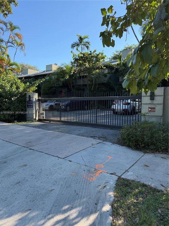 Vehicle entrance gate on west side of property.