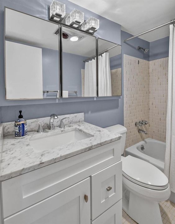 Remodeled bath vanity w tub