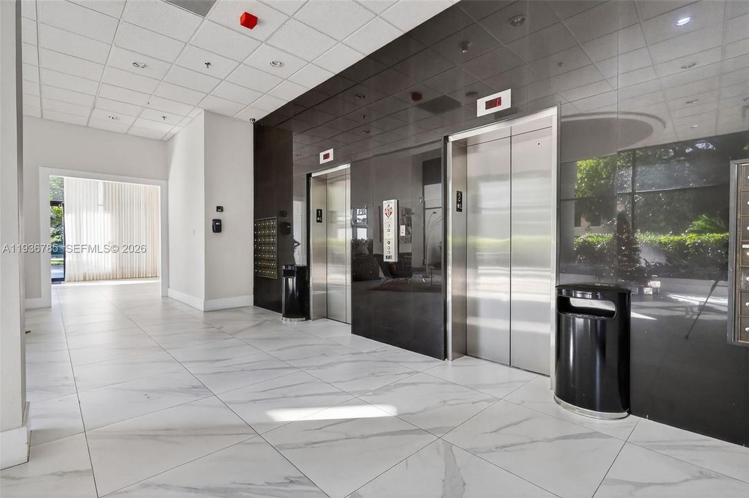 Lobby with two updated elevators