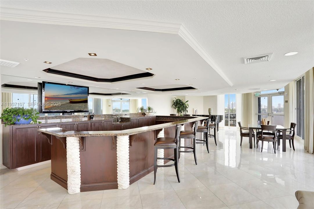 Club Room w/ bar area for serving & for meetings, get togethers and rentals. Baby Grand Piano in corner