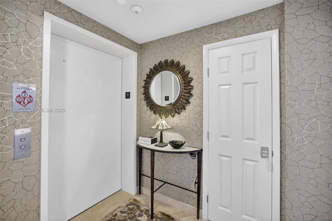 Elevator brings you right to your private / secure foyer. Storage closet on right
