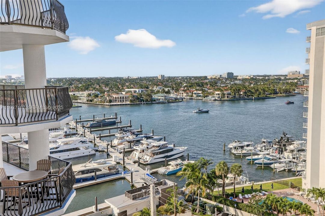 View from the balcony to Intracoastal and the new luxury mega yacht marina. Visualize the view at night, with all homes lit, and the lights bouncing off the waterway.
